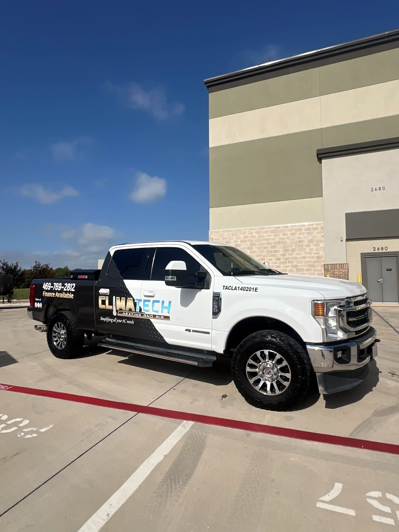 The Climatech Heating and Air wrapped truck, Finance Available painted on the bed